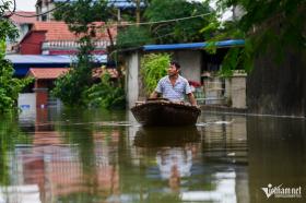 Bão lũ và những đồng tiền lớn hơn mệnh giá ngân hàng