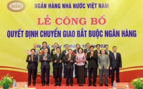 Chính thức chuyển giao bắt buộc 2 ngân hàng 0 đồng